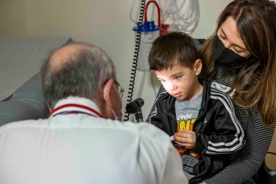 A child interacts with a doctor